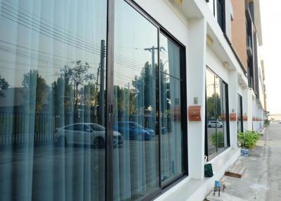 Modern building facade with reflective glass windows