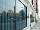 Modern building facade with reflective glass windows