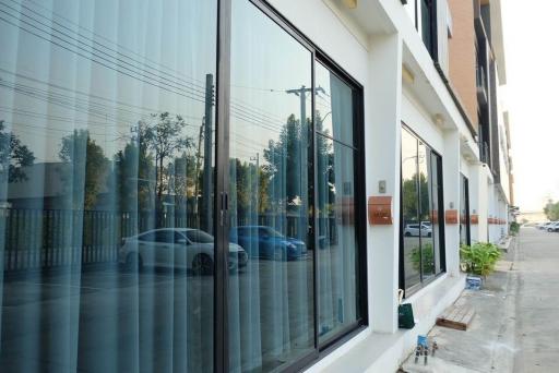 Modern building facade with reflective glass windows