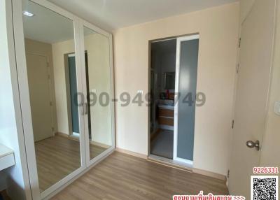 Spacious bedroom with mirrored wardrobe and direct access to en-suite bathroom