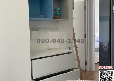 Compact bedroom with built-in desk and wardrobe