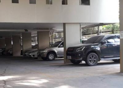 Secure residential parking space with multiple vehicles
