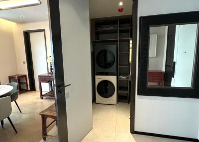 Modern laundry room with washer and dryer in a residential property