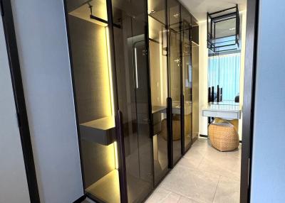 Modern hallway interior with glass partition and wooden flooring