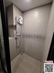 Modern bathroom interior with a walk-in shower and tiling