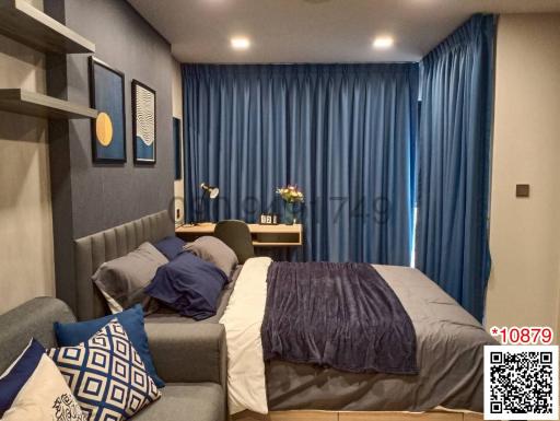 Cozy bedroom with modern decor and blue accents