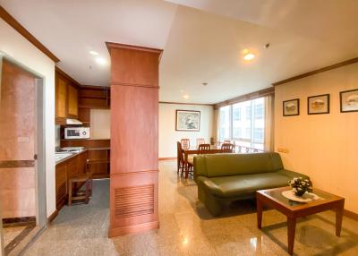 Spacious living room with an open kitchen design