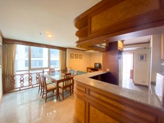 Spacious living room with dining area and open kitchen