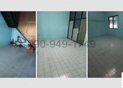 Spacious empty interior of a residential building with tiled flooring and good natural lighting
