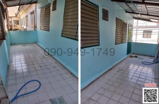 Covered patio area with tiled flooring and wooden shutters