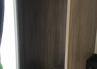 Empty wooden closet in a room