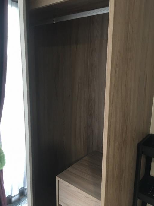 Empty wooden closet in a room