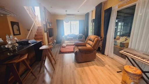 Cozy and well-furnished living room with natural light