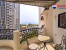 Cozy balcony with a view of the cityscape and a decorative railing