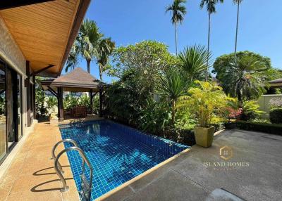 Luxurious private pool with tropical garden in a residential property