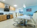 Modern kitchen with dining area in a bright room