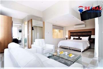 Modern spacious bedroom with adjoining sitting area