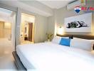 Modern bedroom with sleek design and crisp white bedding
