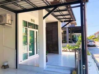 Exterior view of a modern home with carport