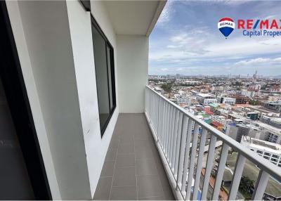 Spacious balcony with cityscape view