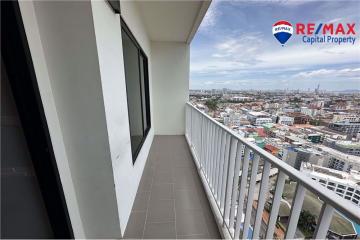 Spacious balcony with cityscape view