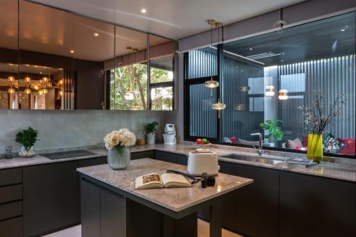 Modern kitchen with stainless steel appliances and elegant decor