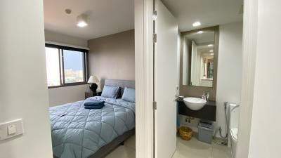 Cozy bedroom with en-suite bathroom and city view