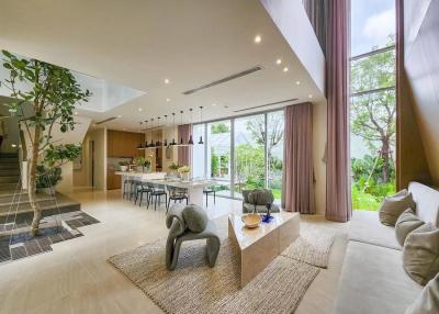 Spacious and modern open concept living room with dining area and kitchen