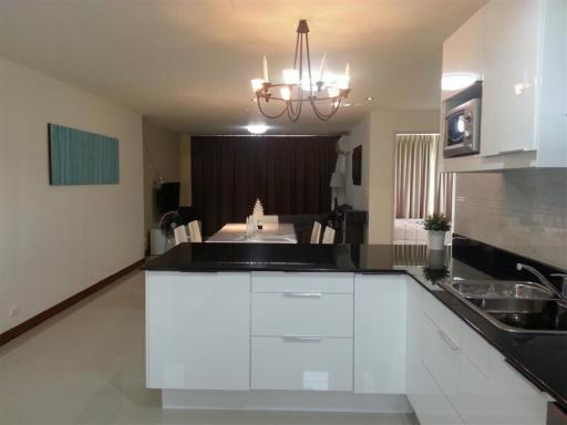 Modern kitchen with stainless steel appliances and a central island