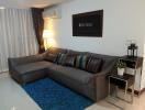 Modern living room with comfortable sectional sofa and decorative elements