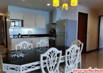 Modern kitchen with dining area and elegant decor