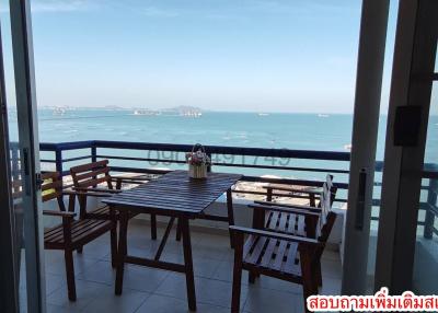 Sea view balcony with outdoor dining set