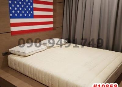 Cozy bedroom with American flag wall decor