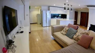 Spacious combined living room and kitchen with modern amenities