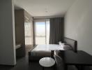 Modern bedroom with natural light and minimalist design