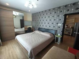 Spacious bedroom with modern design and ample lighting