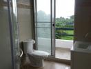 Modern bathroom with large window and natural light