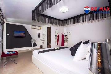 Modern bedroom with king-size bed and elegant decor