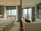 Modern bedroom with integrated living area and city view