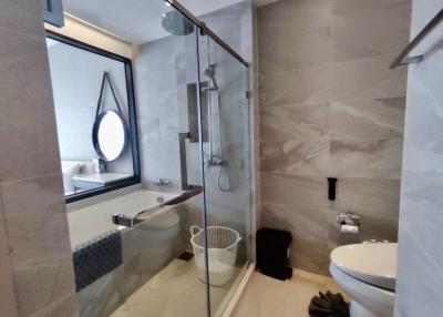 Modern bathroom with glass shower and stylish fixtures