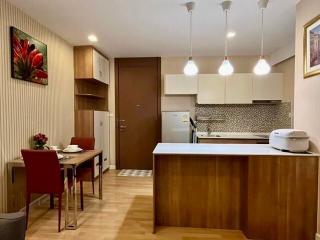 Modern kitchen with dining area in a cozy apartment