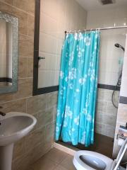 Modern Bathroom Interior with Blue Floral Shower Curtain