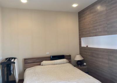 Modern bedroom with warm lighting and elegant decor