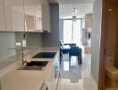 Modern kitchen with a view into the dining area and natural light