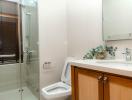 Modern bathroom with shower and wooden vanity