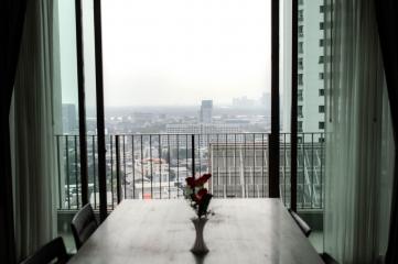 Cozy living room with city skyline view