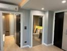 Modern hallway with wooden doors leading to various rooms