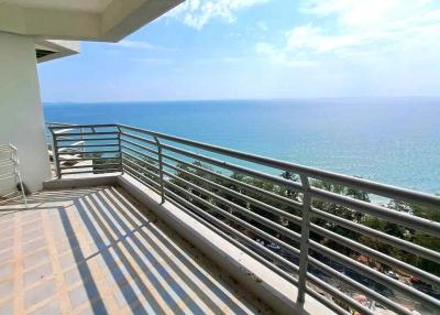 Spacious balcony with ocean view and tiled flooring