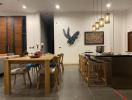 Modern dining room with wooden table and art decoration