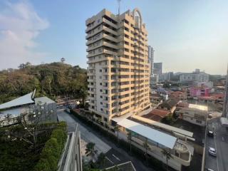 Exterior view of a multi-story residential building in an urban area